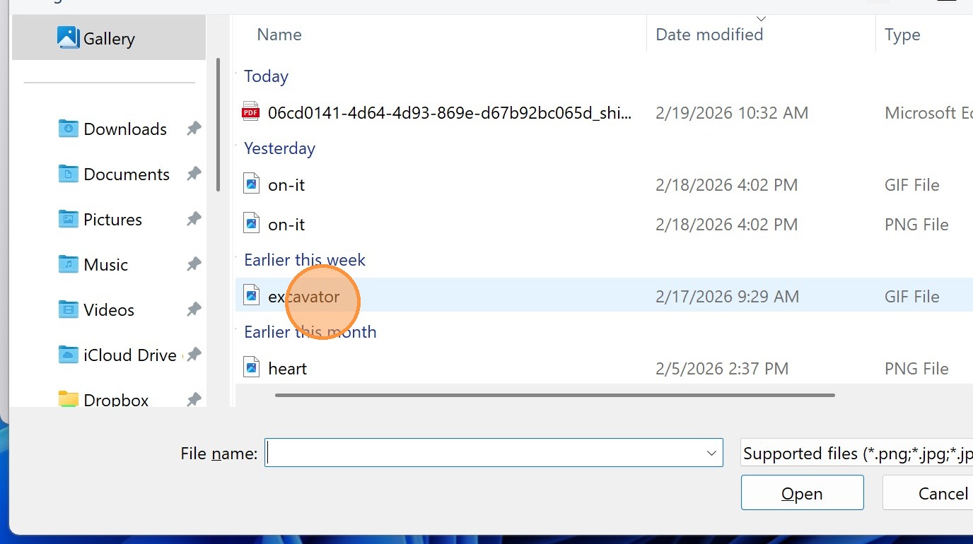 A screenshot of a Windows File Explorer dialog box opened over the Be My Eyes app. In the main file list, an orange circle highlights a GIF file named "excavator." The "Open" button at the bottom of the window is ready to be clicked to upload the image.