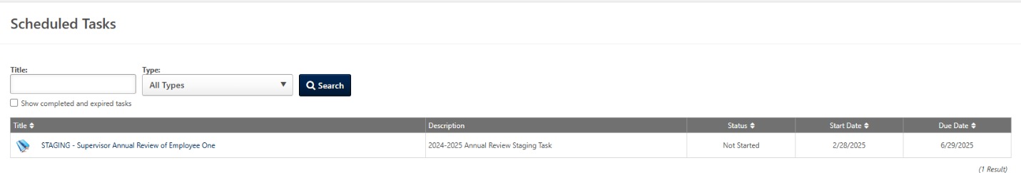 Scheduled Tasks page displaying an Annual Review task assignment with search options and review status information.